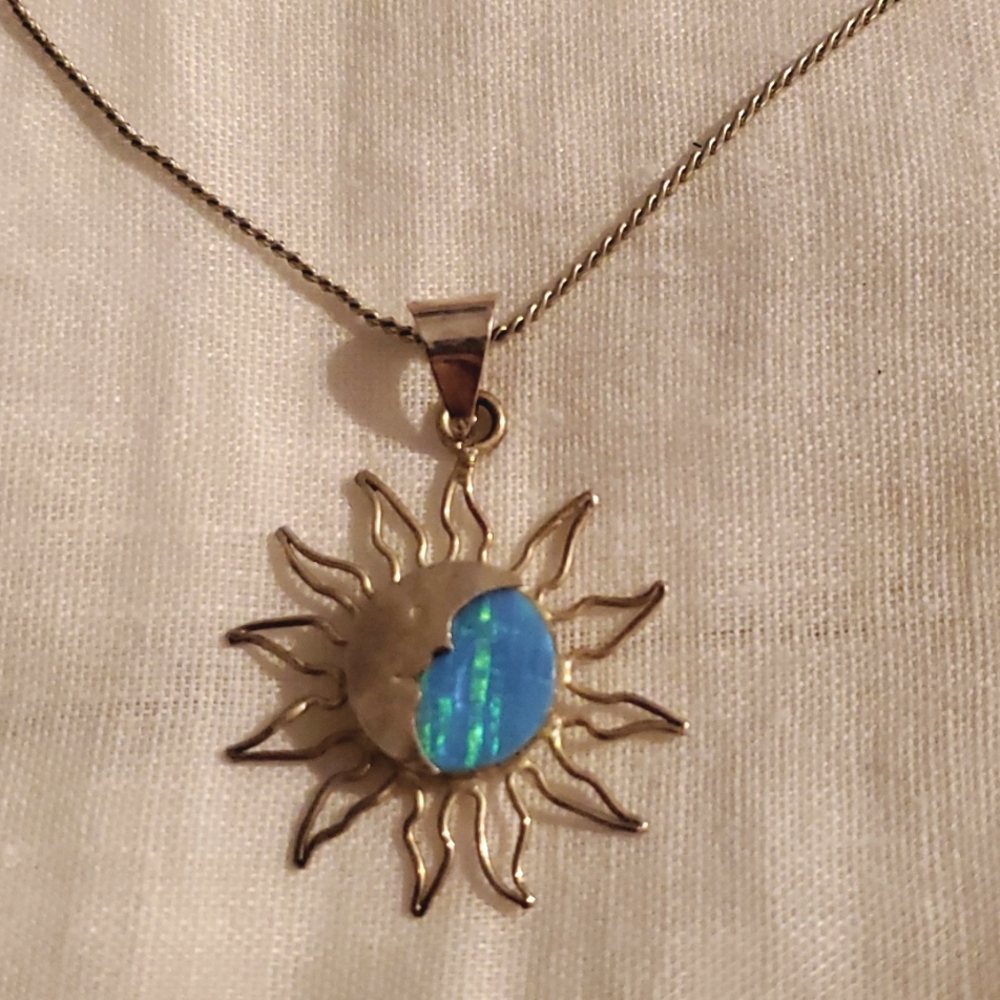 Silver Fire Opal pendant with Moon detail